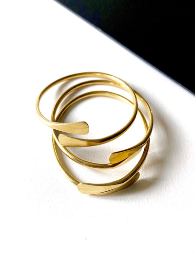 The Coil Brass Bangle (not sold in sets)